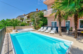 Traumhaftes Penthouse nur 400 Meter zum Strand mit beheizbarem Pool, Meerblick, Babybett, Grill